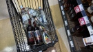A person's purchases are seen in a shopping cart at a government-run BC Liquor Store in Vancouver, on Friday, August 19, 2022. THE CANADIAN PRESS/Darryl Dyck