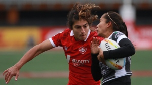 Canada's Bianca Farella looks to tackle Mexico's Daniela Alvarado during the first half of rugby action at the HSBC World Rugby Women's Sevens Series at Starlight Stadium in Langford, B.C., on Saturday, April 30, 2022. Canada will have home-field advantage for this summer's Rugby Americas North Sevens, which serves as the regional qualifier for the 2024 Paris Olympic Games. THE CANADIAN PRESS/Chad Hipolito