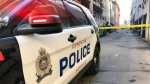 An EPS vehicle blocks an alley in the area of Jasper Avenue and 100 Street on March 31, 2023 (John Hanson/CTV News Edmonton)