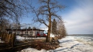 One of many cottages sits along Pigeon Lake Alta, May 1, 2022. THE CANADIAN PRESS/Jason Franson