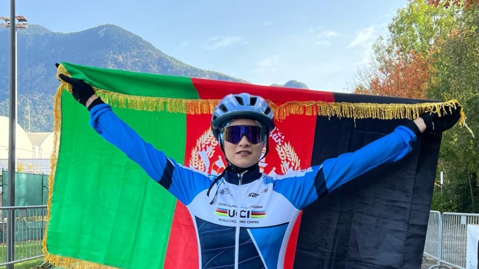 Najila Sakhizada holds Afghanistan flag