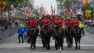 Members of the Royal Canadian Mounted Police (RCMP) are seen during a parade in honour of the late Queen Elizabeth II as it makes its way down Wellington St., in Ottawa, on Sept. 19, 2022. The RCMP is hoping to boost recruitment numbers in marking its upcoming 150th anniversary — even as the national force's structure and practices come under damning new scrutiny. (THE CANADIAN PRESS/Spencer Colby)