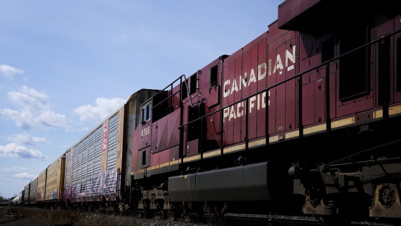 Canadian Pacific Railway trains sit idle on the train tracks at the main CP Rail trainyard in Toronto on Monday, March 21, 2022. THE CANADIAN PRESS/Nathan Denette
