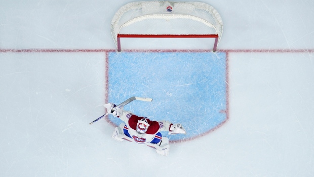 Montreal Canadiens' Cayden Primeau stretches during the second period of an NHL hockey game against the Philadelphia Flyers, Tuesday, March 28, 2023, in Philadelphia. (AP Photo/Matt Slocum)