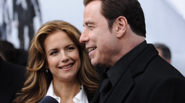 John Travolta and wife actress Kelly Preston attend the premiere of 'From Paris With Love' at the Ziegfeld Theatre on Thursday, Jan. 28, 2010 in New York. (AP / Evan Agostini)