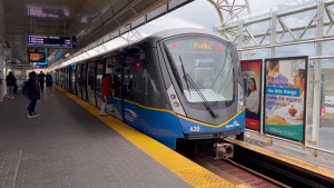 A SkyTrain is seen at a station in Vancouver on Tuesday, April 18, 2023. (CTV)