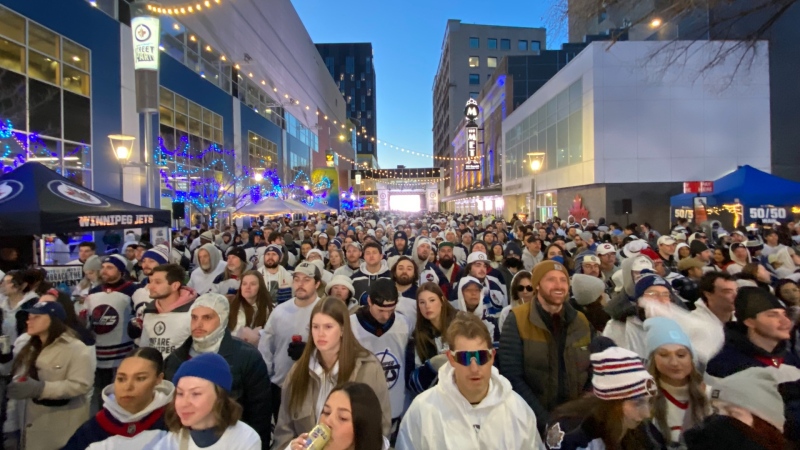 Thousands of Jets fans flood Downtown Winnipeg for the second Whiteout Street Party in the 2023 Stanley Cup playoffs on April 24, 2023. (Danton Unger/CTV News Winnipeg)