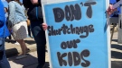 A demonstrator's sign can be seen at the Rally for Public Education at the Saskatchewan Legislature on April 29, 2023. (Luke Simard/CTV News)