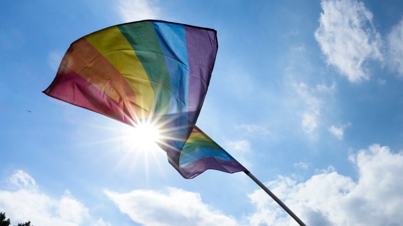 Halifax RCMP says three youths were motivated by hate when they burned a Pride flag outside their school in late April. A rainbow flag is shown during the annual pride march in Berlin, Germany, Saturday, July 23, 2022. (THE CANADIAN PRESS/AP- Markus Schreiber)