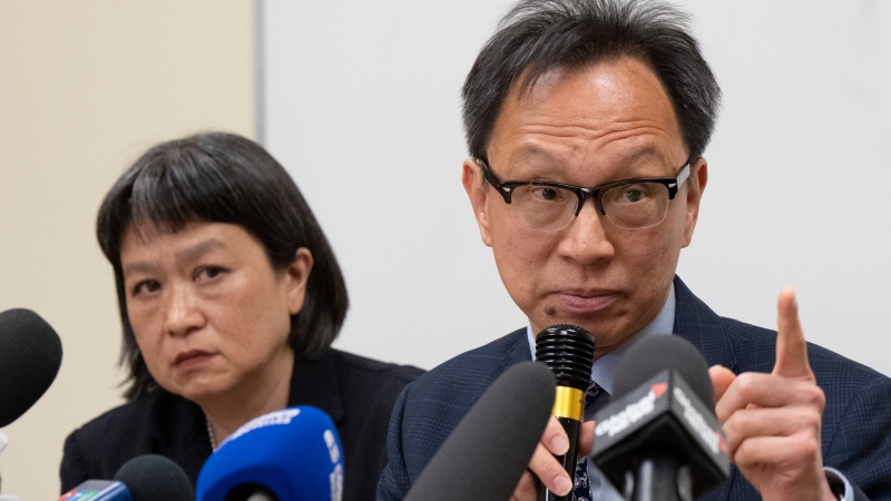 Sen.Yuen Pau Woo denounces RCMP allegations of Chinese government interference in Canada as community organizer May Chiu looks on during a news conference at the Chinese Family Service center, Friday, May 5, 2023 in Montreal.THE CANADIAN PRESS/Ryan Remiorz