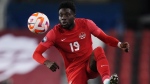 Canada midfielder Alphonso Davies (19) controls the ball against Honduras during first half CONCACAF Nations League soccer action in Toronto on Tuesday, March 28, 2023. Davies has been named the CONCACAF Men’s Player of the Year for the second year in a row. THE CANADIAN PRESS/Nathan Denette
