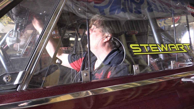 Stewart Addley fires up his 1965 Plymouth Satellite dragster, 19 months after it was rebuilt from scratch. The car was stolen in 2021, and recovered five months later. Pictured in London, Ont. on Sunday, May 7, 2023.(Brent Lale/CTV News London)