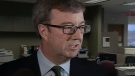 Jim Watson talks to reporters after registering for the mayor's race in Ottawa, Monday, Feb. 1, 2010.