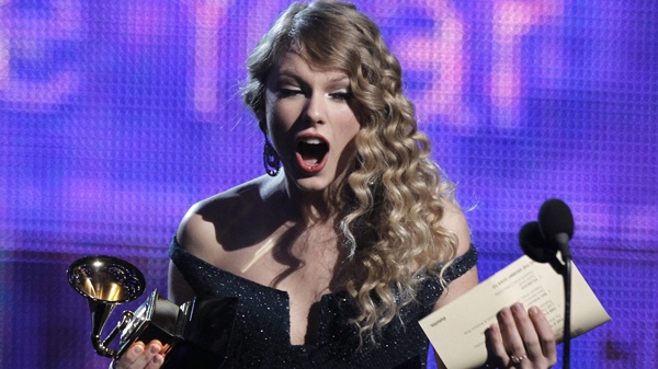 Taylor Swift reacts as she accepts the album of the year award at the Grammy Awards on Sunday, Jan. 31, 2010, in Los Angeles. (AP / Matt Sayles)
