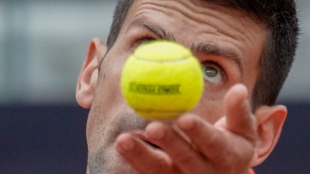 Novak Djokovic serves the ball at the Italian Open