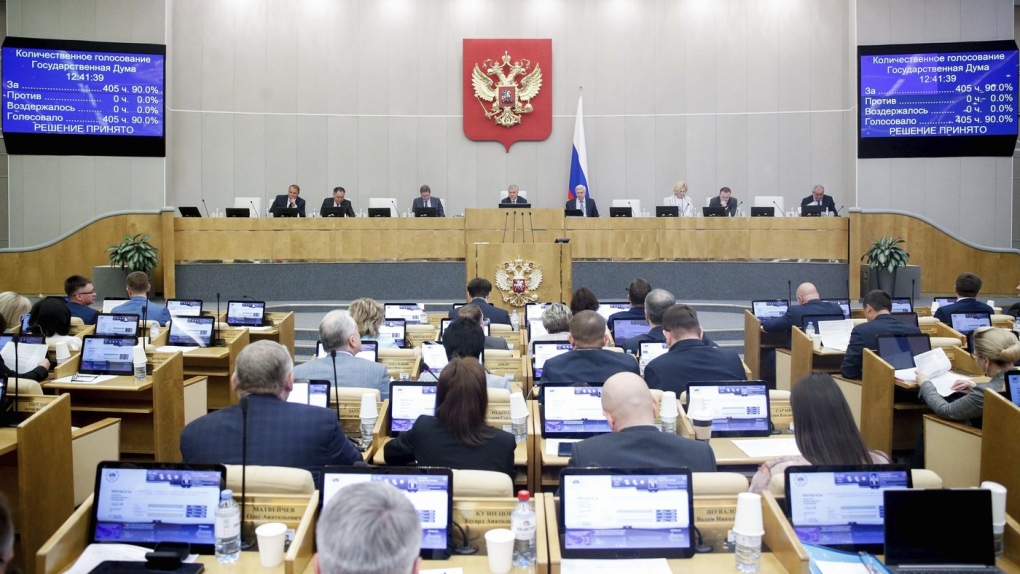 Russian lawmakers attend a session