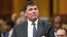 Minister of Intergovernmental Affairs, Infrastructure and Communities Dominic LeBlanc rises during Question Period in the House of Commons on Parliament Hill in Ottawa on Thursday, May 18, 2023. THE CANADIAN PRESS/ Patrick Doyle