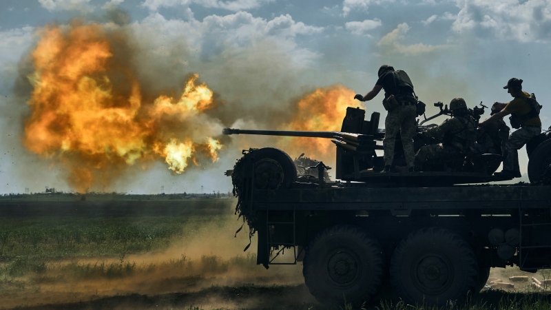 Ukrainian soldiers fire near Bakhmut, an eastern city where fierce battles against Russian forces have been taking place, in the Donetsk region, Ukraine, Monday, May 15, 2023. (AP Photo/Libkos)