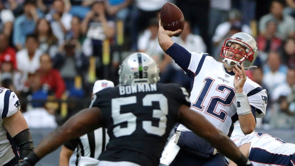 Tom Brady in NFL action against the Raiders, 2017