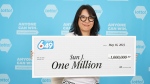 Sun Jie, the latest B.C. resident to win $1 million in a Lotto 6/49 draw, is considering using the prize money to take her family on a trip to Japan. (BCLC)
