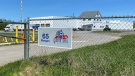 The gate leading to the Coastal Shell Products facility is pictured on May 23, 2023. (Derek Haggett/CTV)