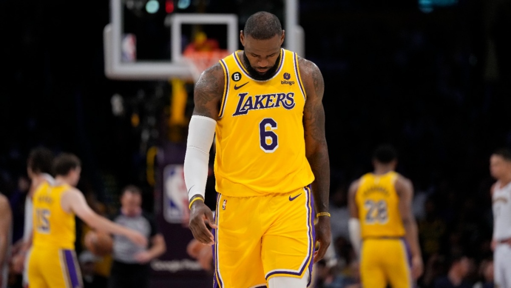 Los Angeles Lakers forward LeBron James looks down