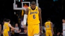 Los Angeles Lakers forward LeBron James looks down in the closing minutes of a loss to the Denver Nuggets, on May 22, 2023. (Ashley Landis / AP)