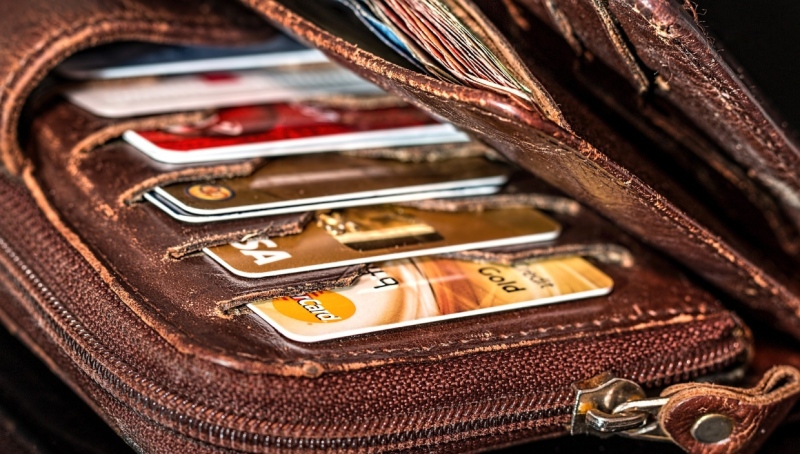 A stock photo shows a wallet packed with debit and credit cards. (pixabay.com/stevepb)