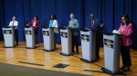 Toronto mayoral candidates Josh Matlow, left to right, Olivia Chow, Mitzi Hunter, Brad Bradford, Mark Saunders and Ana Bailão take the stage at a mayoral debate in Scarborough, Ont. on Wednesday, May 24, 2023. THE CANADIAN PRESS/Chris Young