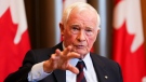 David Johnston, Independent Special Rapporteur on Foreign Interference, presents his first report in Ottawa on Tuesday, May 23, 2023. THE CANADIAN PRESS/Sean Kilpatrick