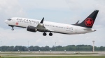 An Air Canada jet takes off from Trudeau Airport in Montreal, Thursday, June 30, 2022. THE CANADIAN PRESS/Graham Hughes