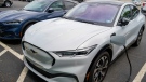 In this photo made on Thursday, May 6, 2021, a pair of 2021 Ford Mustang Mach E are seen at a Ford dealer in Wexford, Pa. (AP Photo/Keith Srakocic)