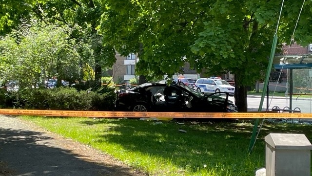 Police tape surrounds the car involved in the collision on Côte Saint-Luc Road in NDG on Friday, May 26, 2023. (Rob Lurie/CTV News)