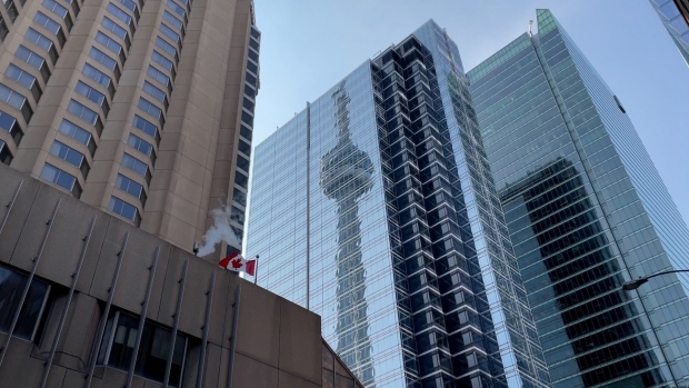 Downtown Toronto with the CN Tower reflecting on a high-rise's building windows. (CTV News Toronto)