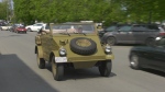 A military vehicle drives down Main Street West in Merrickville, Ont. on Saturday. A Canadian war movie is filming in several towns across eastern Ontario. (Nate Vandermeer/CTV News Ottawa)