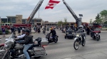 Starting from Earls Polo Park, motorcycle riders rode west in a police-escorted parade down Portage Avenue to Assiniboia Downs, then north to Selkirk, Gimli and back. (Source: Gary Robson, CTV News)