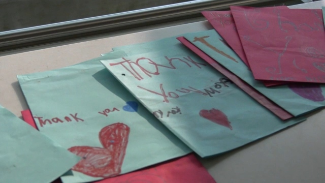 Edmonton Grade 1 students spent the weekend making handmade thank-you cards for a group of New Brunswick wildland firefighters who returning home after two weeks battling a blaze in northern Alberta. (Brandon Lynch/CTV News Edmonton)