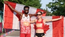 Moh Ahmed, left, and Natasha Wodak, right, pose after winning the Canadian 10K Championships at Tamarack Ottawa Race Weekend. May 27, 2023. (Photo credit: Victah Sailer)