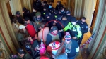 This image from U.S. Capitol Police security video and contained in the government's sentencing memorandum for Donald Hazard, circled in red by source, shows him in the U.S. Capitol on Jan. 6, 2021, in Washington. Donald Hazard was sentenced Friday, May 19, 2023, to nearly five years in prison for attacking police officers at the U.S. Capitol, seriously injuring one of them during a mob's attack on Jan. 6, 2021. (Department of Justice via AP)