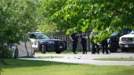 Hamilton police on scene after a landlord-tenant dispute left three dead in a residence in Stoney Creek. (Simon Sheehan/CP24)