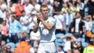 Leeds United's Rasmus Kristensen applauds at the end of the English Premier League soccer match between Leeds United and Newcastle United at Elland Road in Leeds, England, Saturday, May 13, 2023. (AP Photo/Rui Vieira)