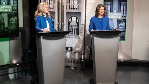 Leader of the NDP Rachel Notley, left, and Leader of the United Conservative Party Danielle Smith prepare for a debate in Edmonton on Thursday, May 18, 2023. (THE CANADIAN PRESS/Jason Franson)