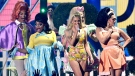 Kelsea Ballerini, centre, performs 'If You Go Down (I'm Going Down Too)' accompanied by drag queens Manila Luzon, from left, Jan Sport, Olivia Lux and Kennedy Davenport at the CMT Music Awards in Austin, Texas, on April 2, 2023. (Evan Agostini / Invision / AP)