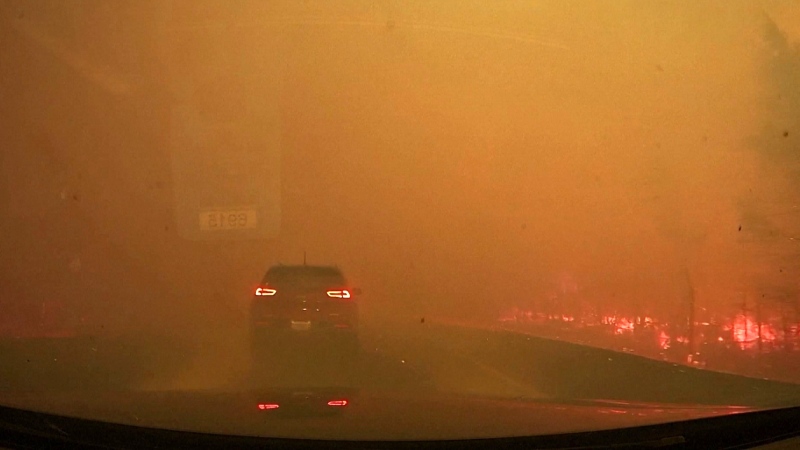 Dashcam video shows the Tantallon wildfire burning in Hammonds Plains, N.S. on May 28, 2023 (Source: Instagram/@alka.films via Reuters)