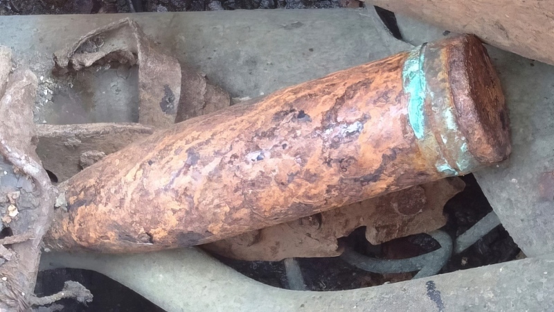 This undated photo released by the Malaysian Maritime Enforcement Agency (MMEA) on Monday, May 29, 2023, shows scrap metal and an old cannon shell on a Chinese-registered vessel after detained by MMEA in the waters of east Johor. (Malaysian Maritime Enforcement Agency via AP)