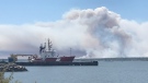 Shelburne Wharf pictured with plumes of smoke from wildfires May 29, 2023. (CTV Atlantic/Jonathan MacInnis)