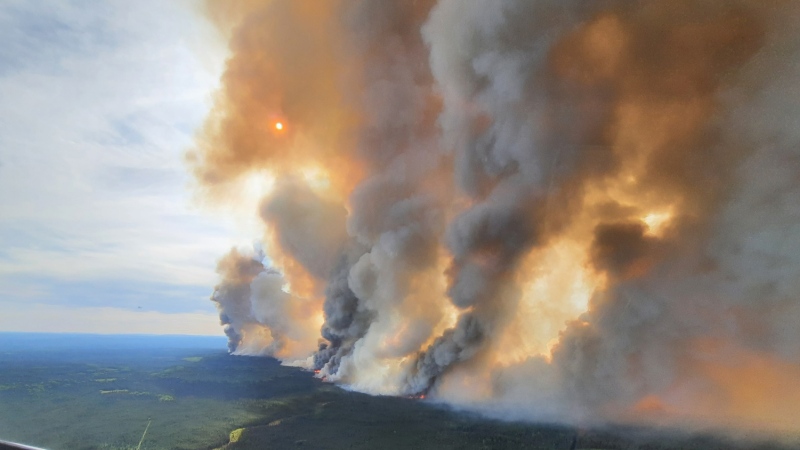 The Donnie Creek wildfire (G80280) burns in an area between Fort Nelson and Fort St. John, B.C. in this undated handout photo. (THE CANADIAN PRESS/HO, BC Wildfire Service)