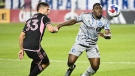 CF Montreal's Sunusi Ibrahim, challenges Inter Miami's Franco Negri for the ball during second half MLS soccer action in Montreal, Saturday, May 27, 2023. THE CANADIAN PRESS/Graham Hughes