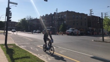 A cyclist takes a bike path in Montreal. The city continues to expand its network with hopes of adding 200 kilometres of paths by 2027. (Scott Prouse/CTV News)