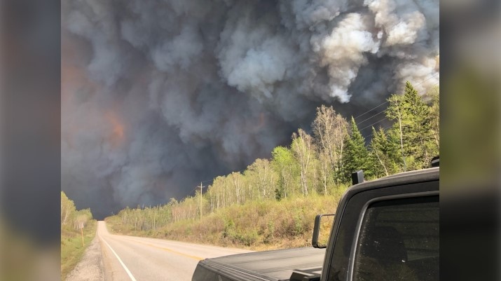 Smoke and flames seen from closed Highway 631 near White River. May 29/23 (Ontario Provincial Police)